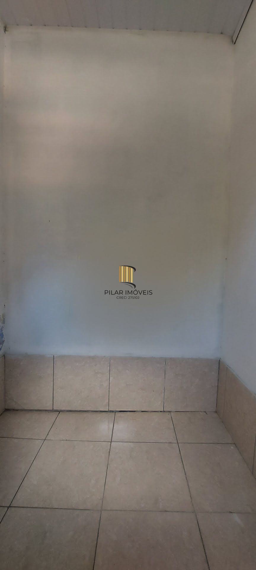 Imóvel com 2 moradias e ponto comercial em Alvorada