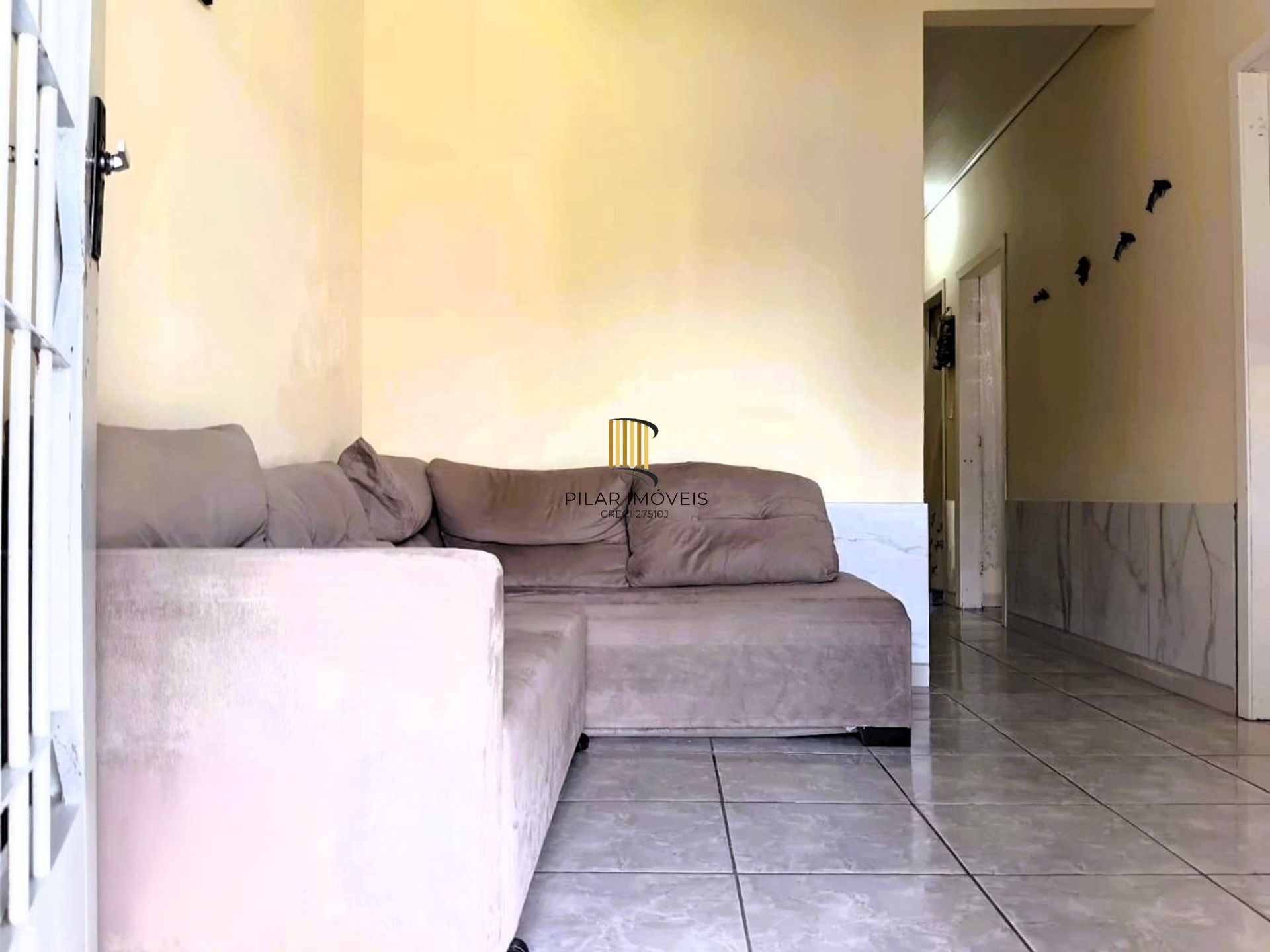 Casa de 3 dormitórios e 2 vagas de garagem em Canoas.