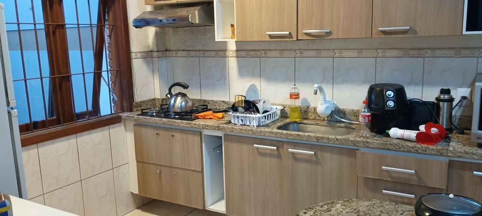 Casa 2 dormitórios com garagem e churrasqueira no Sarandi