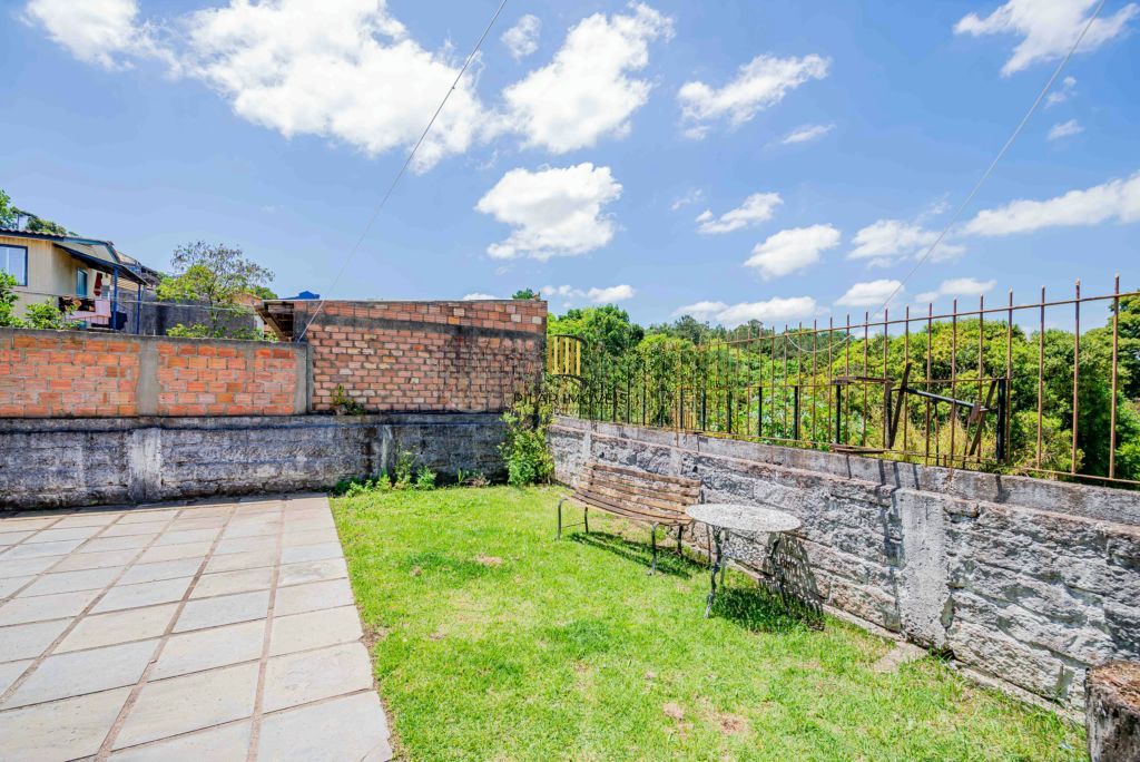 Casa com 3 quartos e 4 vagas à venda em Vila Nova