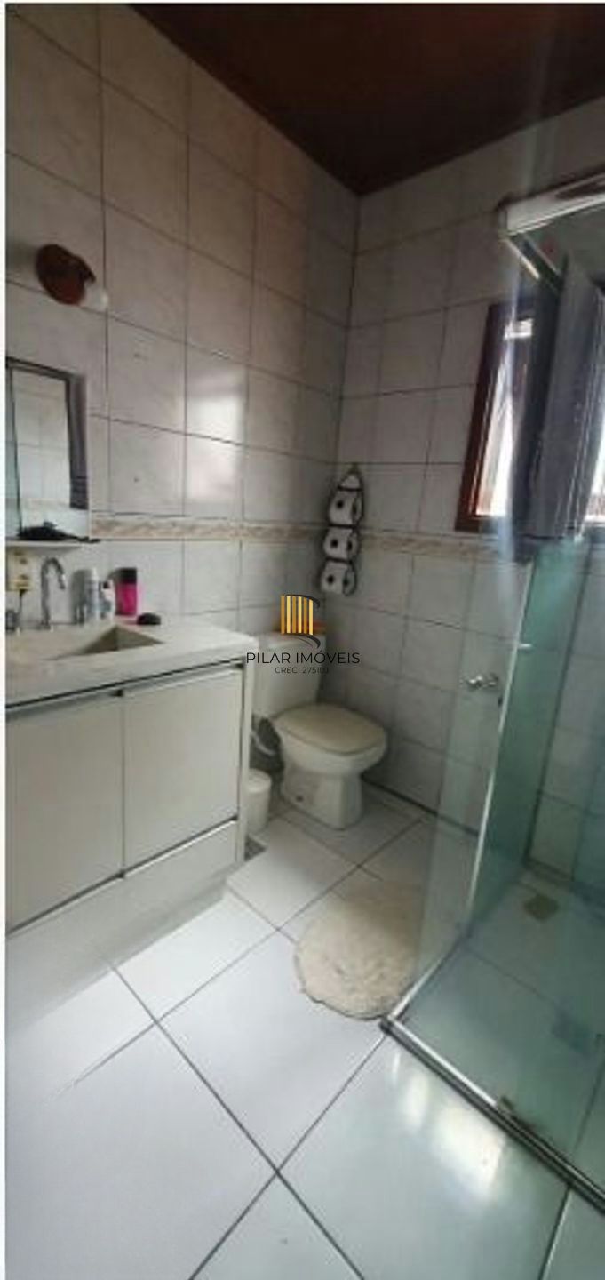 Casa com 5 quartos, piscina e 3 vagas de garagem em Canoas.