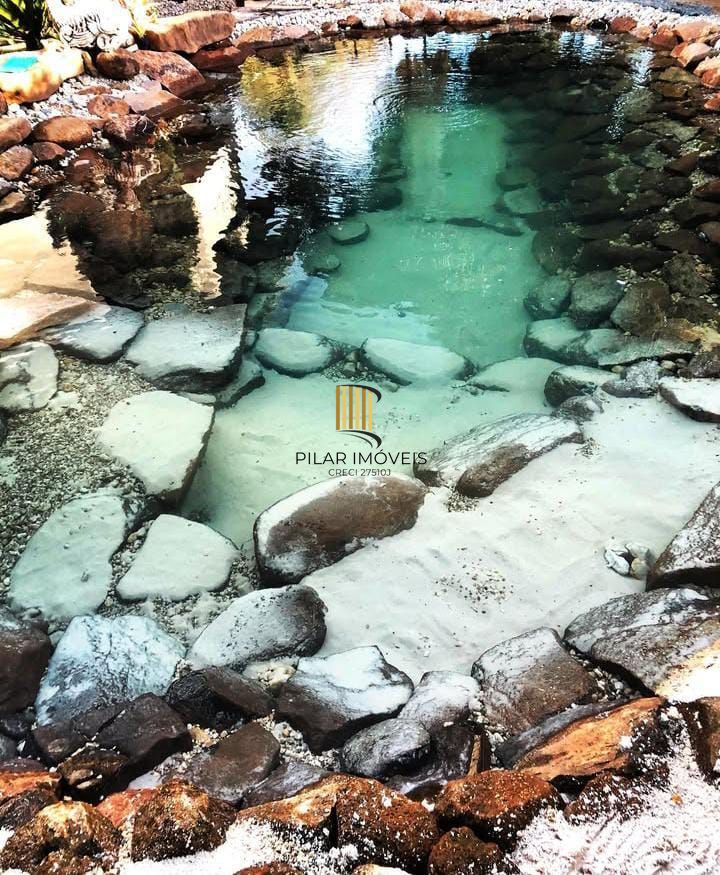 Casa de Esquina com 5 dormitórios com lago ornamental em Taquara - Pilar Imóveis