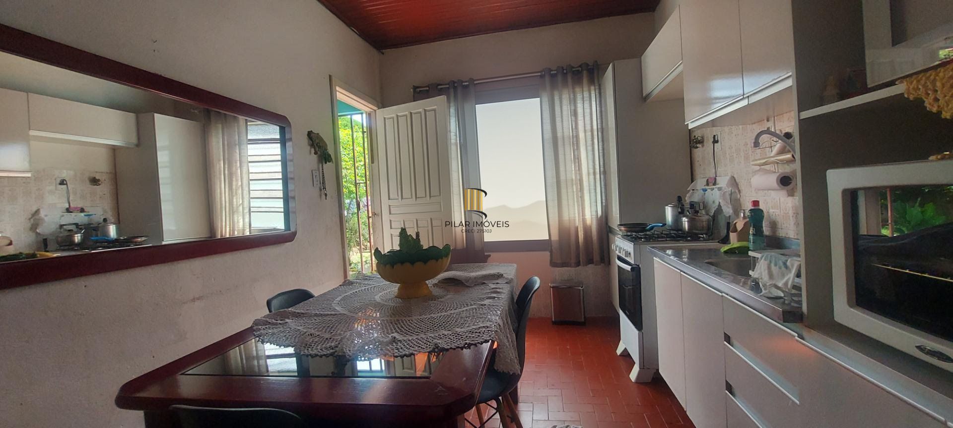 Imóvel com 2 moradias e ponto comercial em Alvorada