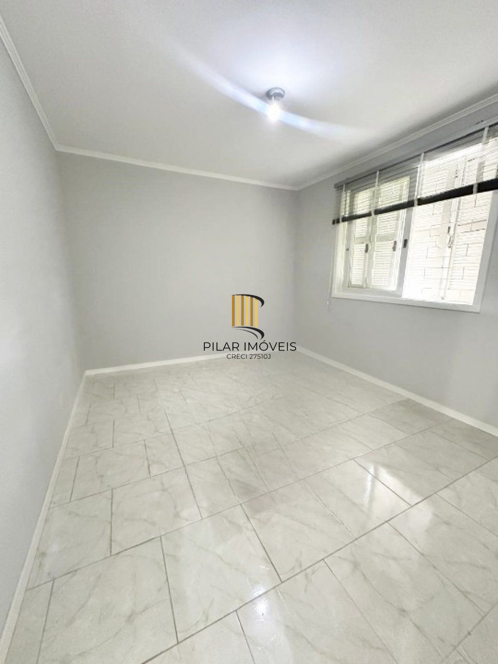 Apartamento térreo com 2 quartos e 1 vaga de garagem no Bairro Auxiliadora