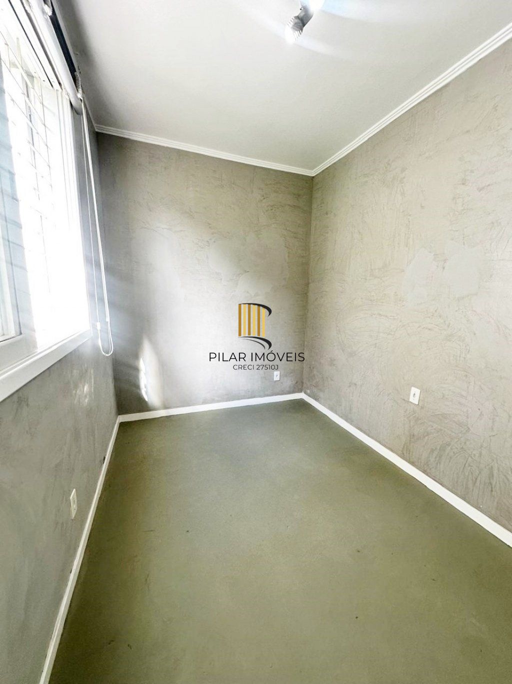 Apartamento térreo com 2 quartos e 1 vaga de garagem no Bairro Auxiliadora