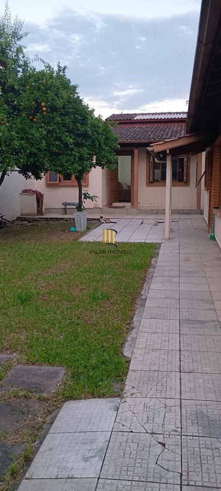 Casa 2 dormitórios com garagem e churrasqueira no Sarandi