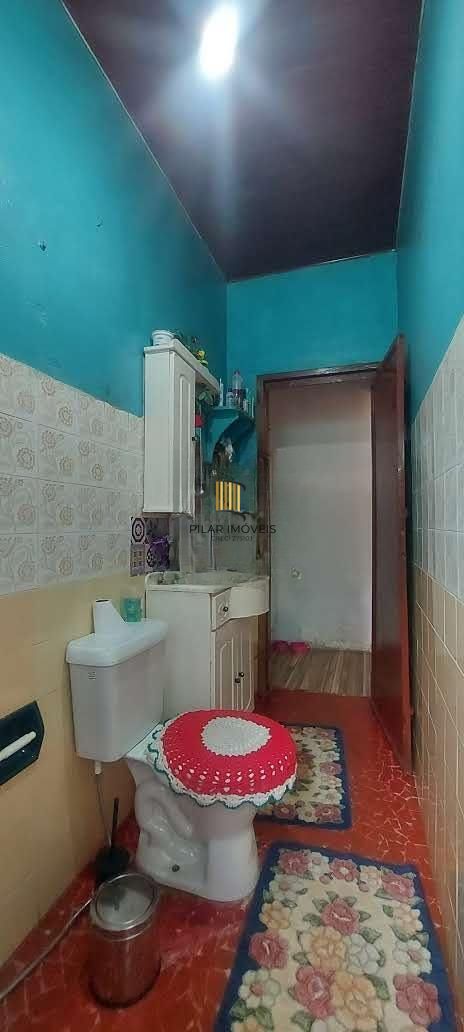 Imóvel com 2 moradias e ponto comercial em Alvorada