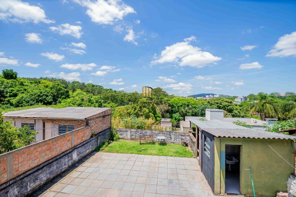 Casa com 3 quartos e 4 vagas à venda em Vila Nova