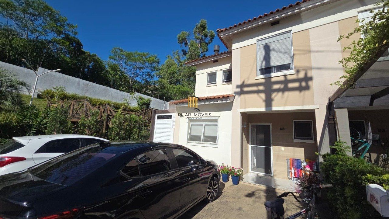 Casa em condomínio com 3 dormitórios e 3 vagas de garagem em Canoas.