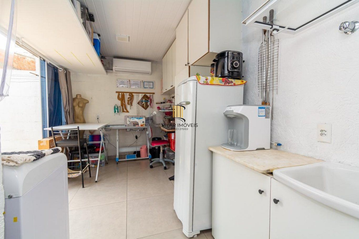 Casa de 2 dormitórios e com 2 vagas de garagem em Cachoeirinha.