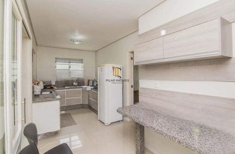 Casa com piscina e 4 suítes no Bairro Vila Ipiranga