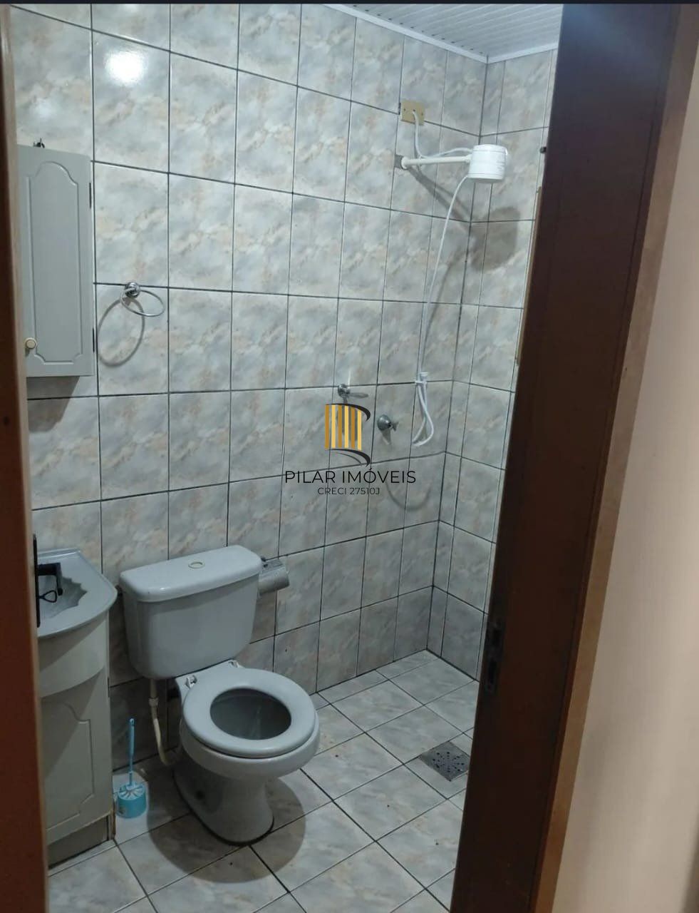 Casa com 3 dormitórios e 2 vagas de garagem em Gravataí.