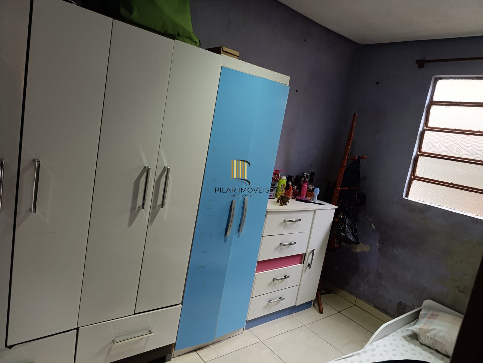 Casa de 2 quartos , pátio, 1 vaga no bairro Lomba do Pinheiro