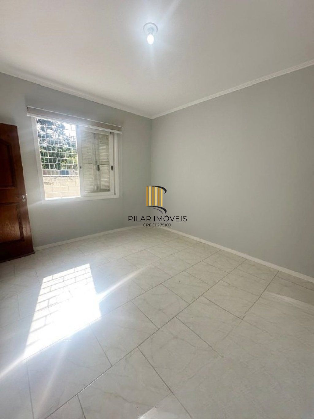 Apartamento térreo com 2 quartos e 1 vaga de garagem no Bairro Auxiliadora