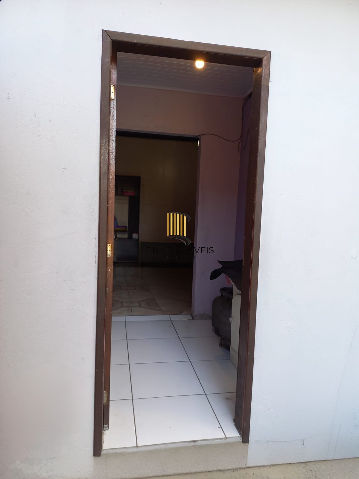 Casa com pátio e edícula no Bairro Porto Verde