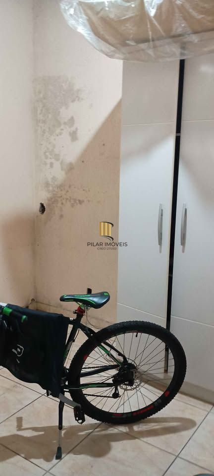 Casa 2 dormitórios com garagem e churrasqueira no Sarandi