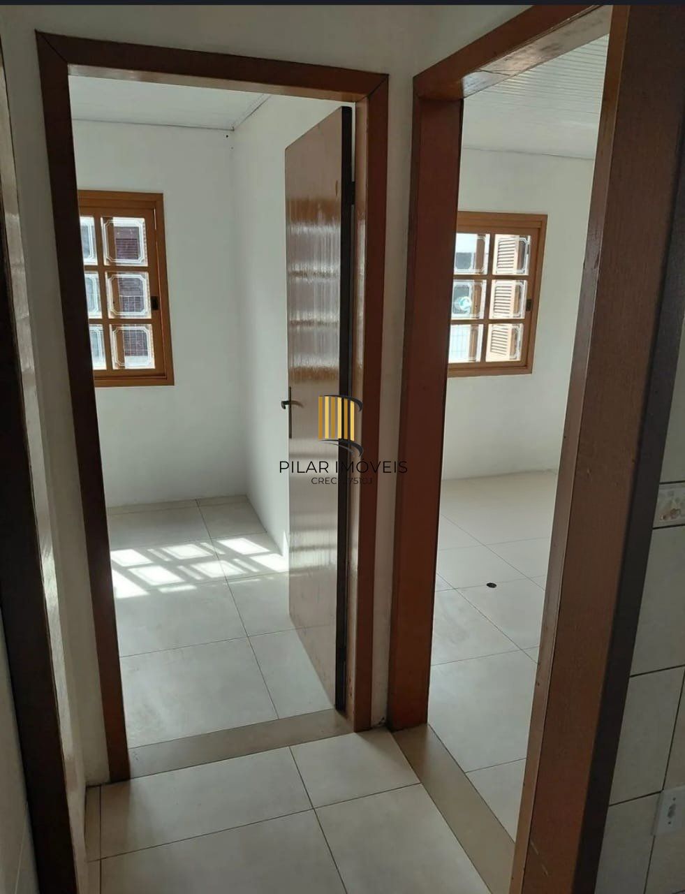 Casa com 3 dormitórios e 2 vagas de garagem em Gravataí.