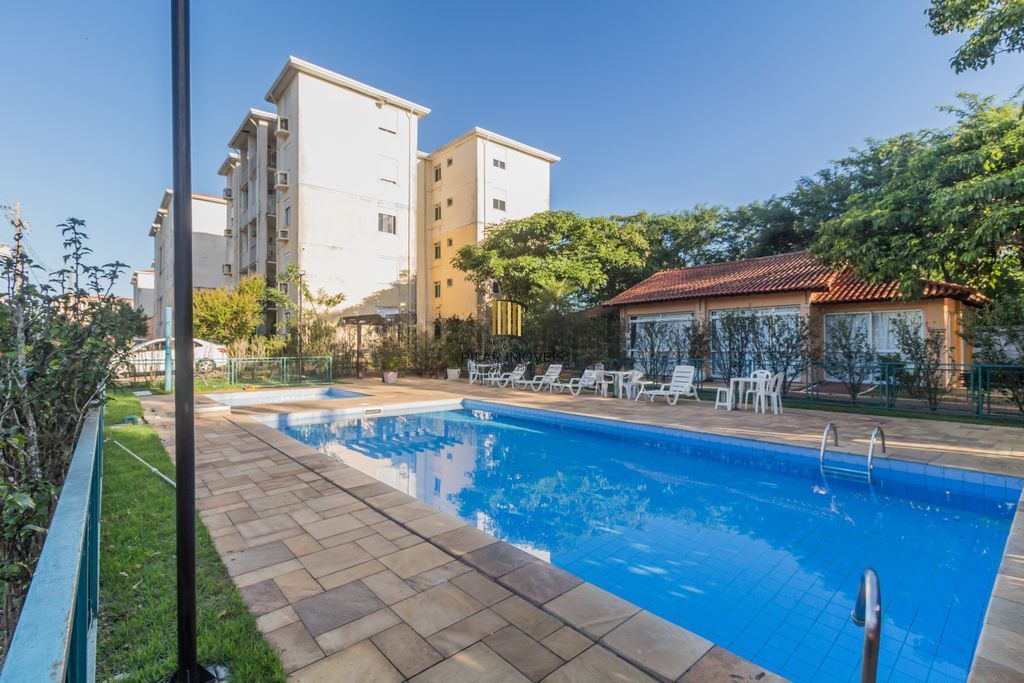 Apartamento com 2 dormitórios e 1 vaga de garagem no Bairro Humaitá