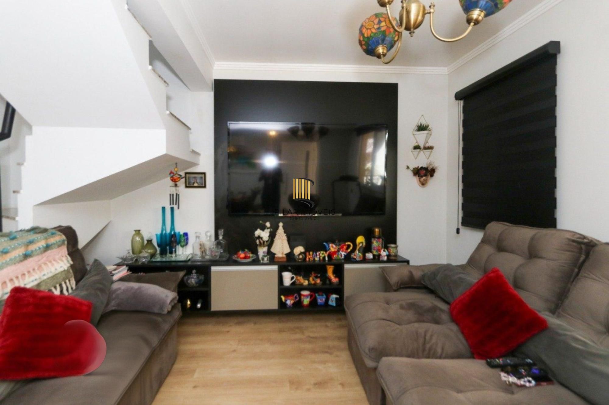 Casa em condomínio com 2 quartos e 2 vagas no bairro Marechal Rondon em Canoas.