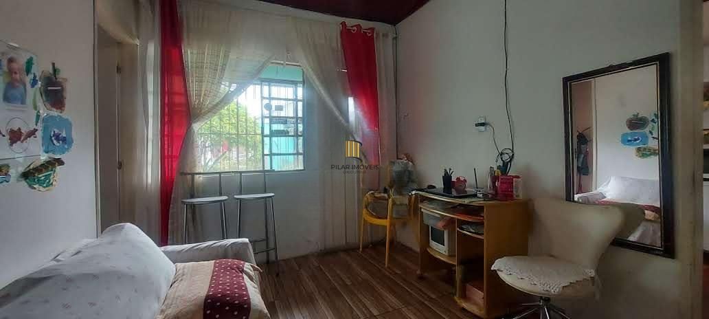 Imóvel com 2 moradias e ponto comercial em Alvorada