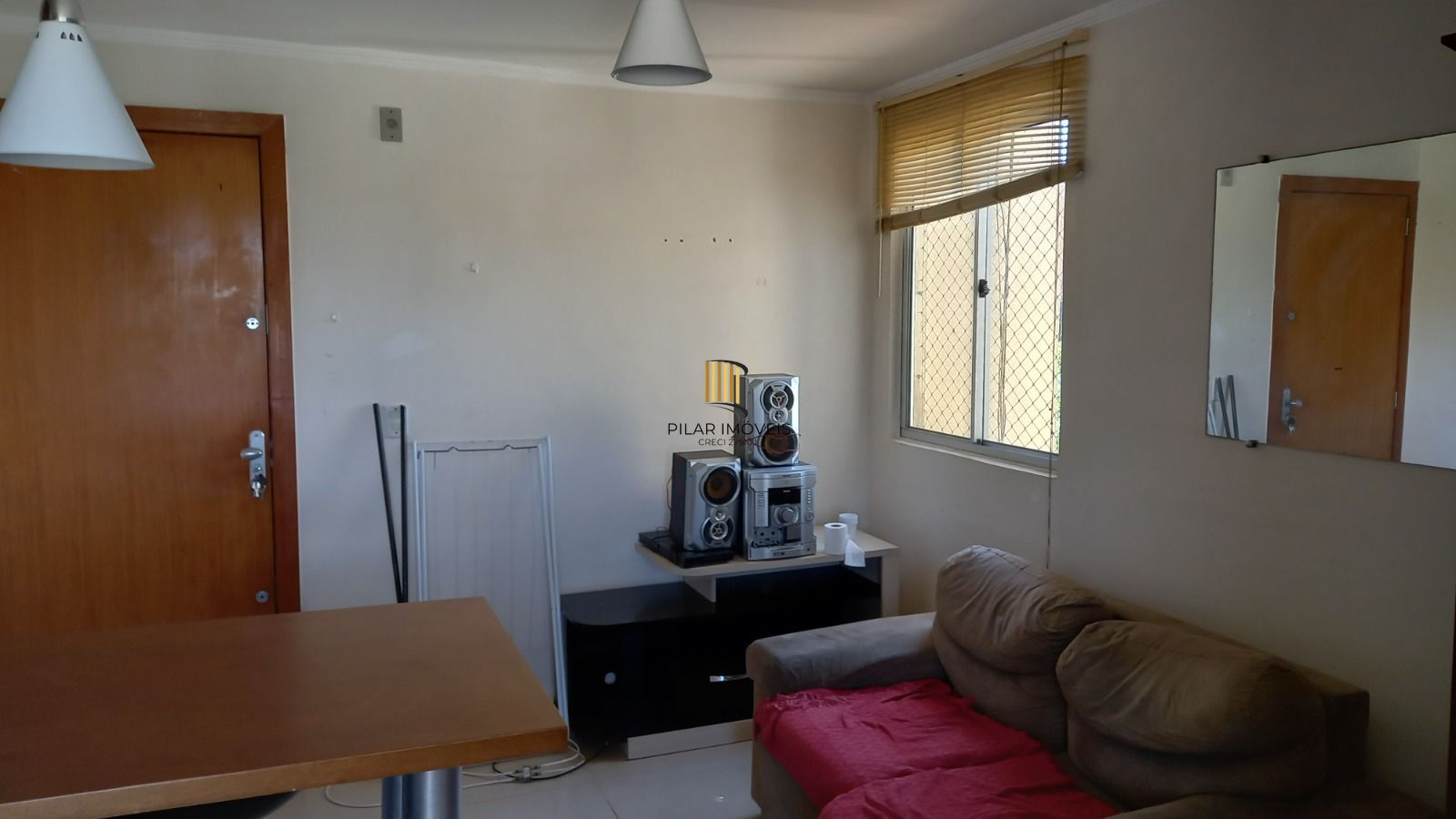 APARTAMENTO 2 DORMITÓRIOS COM VAGA ROTATIVA NO BAIRRO VILA NOVA - Pilar Imóveis