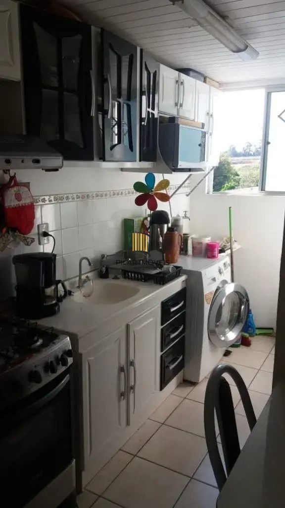 Apartamento com dois dormitórios com garagem