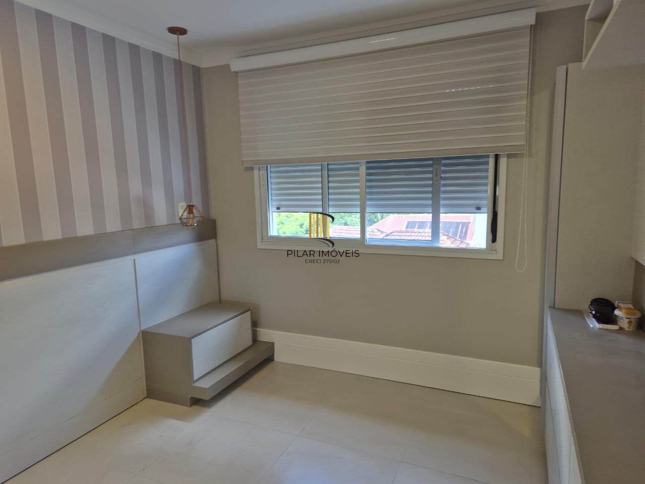 Apartamento com 02 suítes e duas vagas de garagem