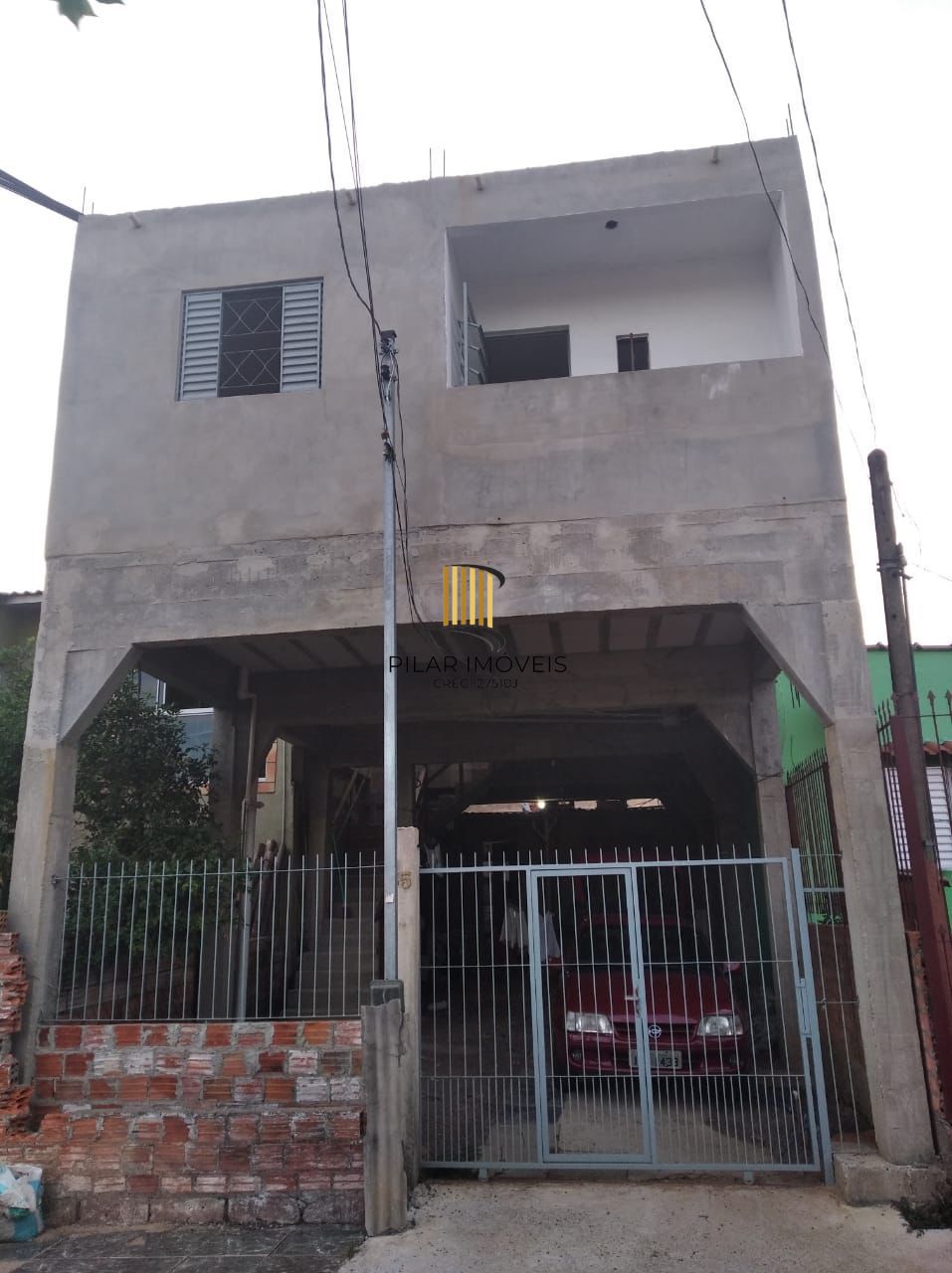 Prédio residencial 125,29 com 03 apartamentos com 02 dormitórios e 4 vagas de garagem - Pilar Imóveis