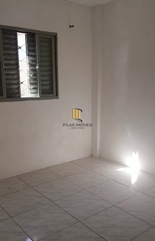 Prédio residencial 125,29 com 03 apartamentos com 02 dormitórios e 4 vagas de garagem