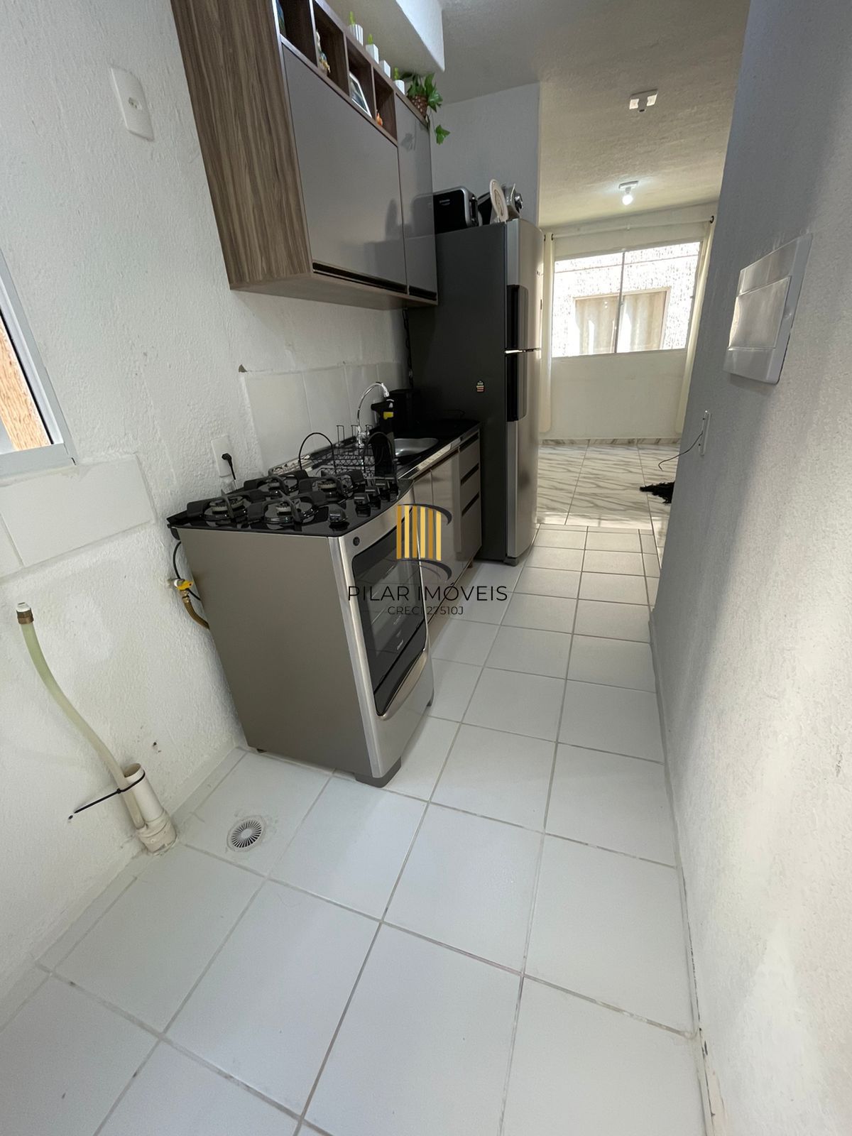 Apartamento com dois dormitórios e vaga de garagem