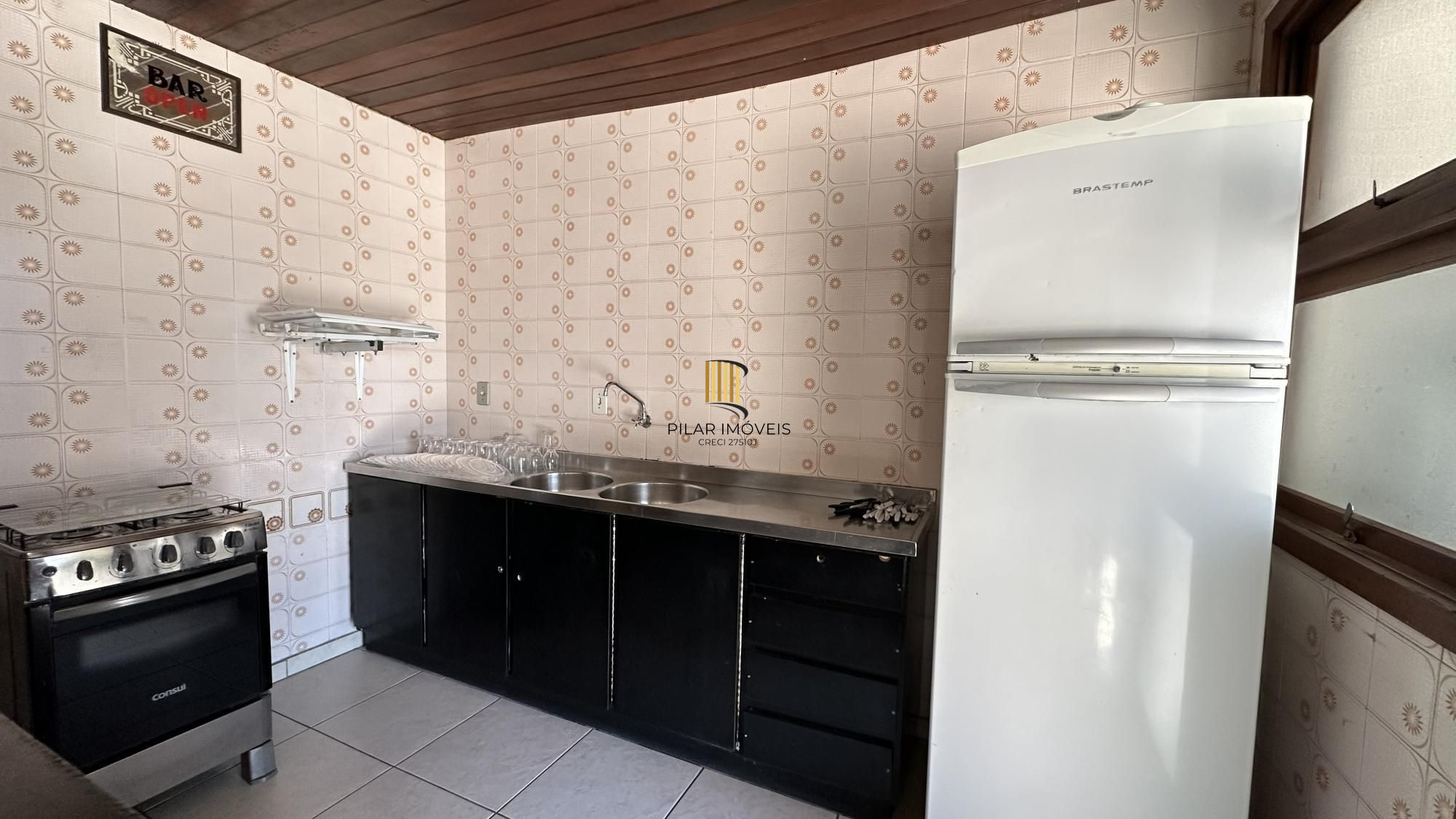 Apartamento com 02 dormitórios e vaga de garagem escriturada