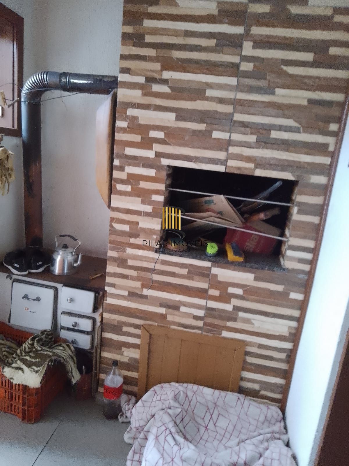 Casa com 04 dormitórios e duas vagas de garagem lado a lado em Balneário Pinhal.