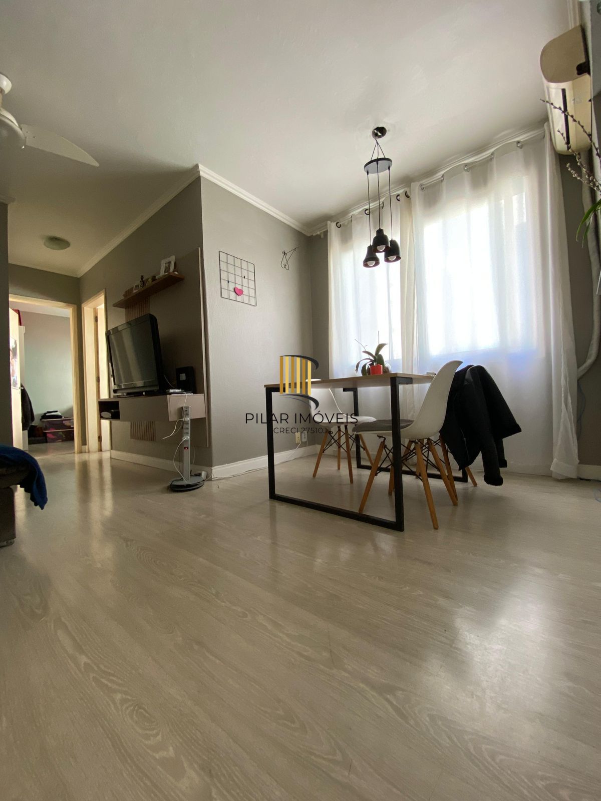 Apartamento 02 dormitórios com vaga de garagem escriturada