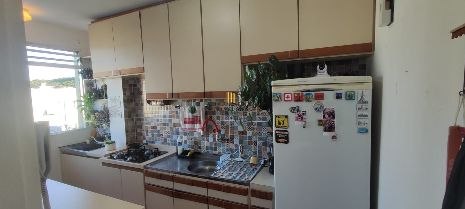 Apartamento 02 dormitórios com garagem / estacionamento