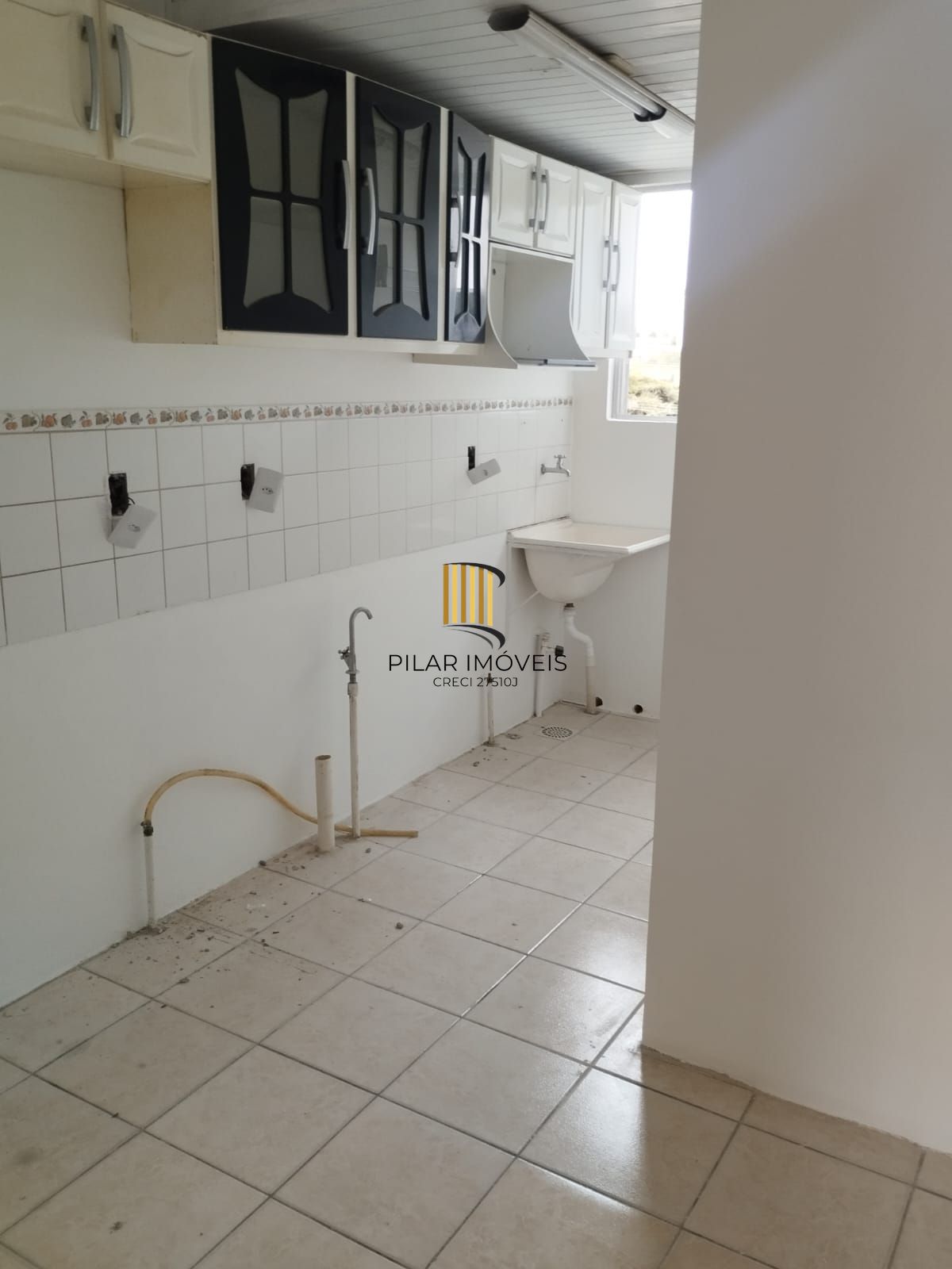 Apartamento com dois dormitórios com garagem