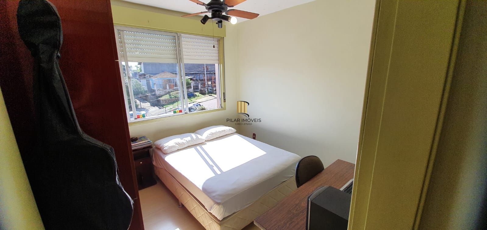 Apartamento com 02 dormitórios semi-mobiliado e um box de garagem