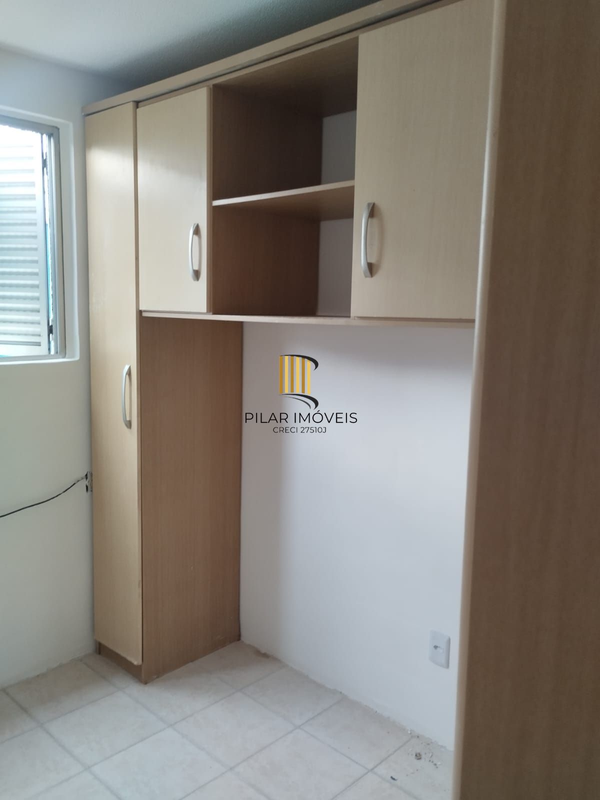 Apartamento com dois dormitórios com garagem