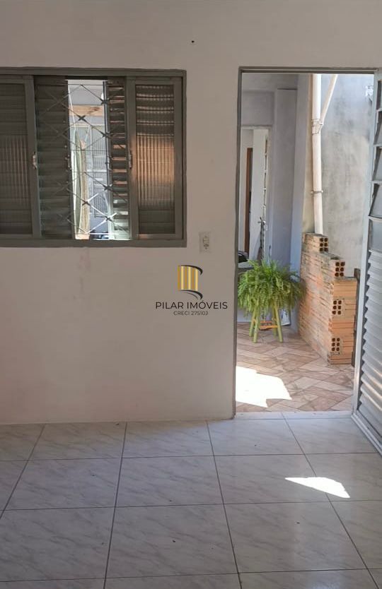 Prédio residencial 125,29 com 03 apartamentos com 02 dormitórios e 4 vagas de garagem