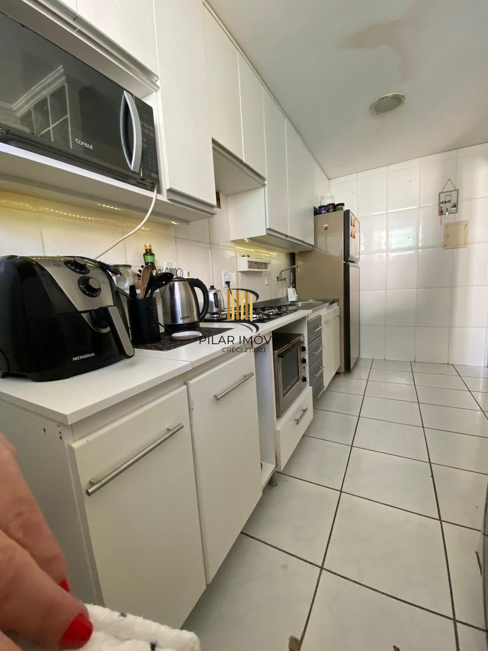 Apartamento 02 dormitórios com vaga de garagem escriturada