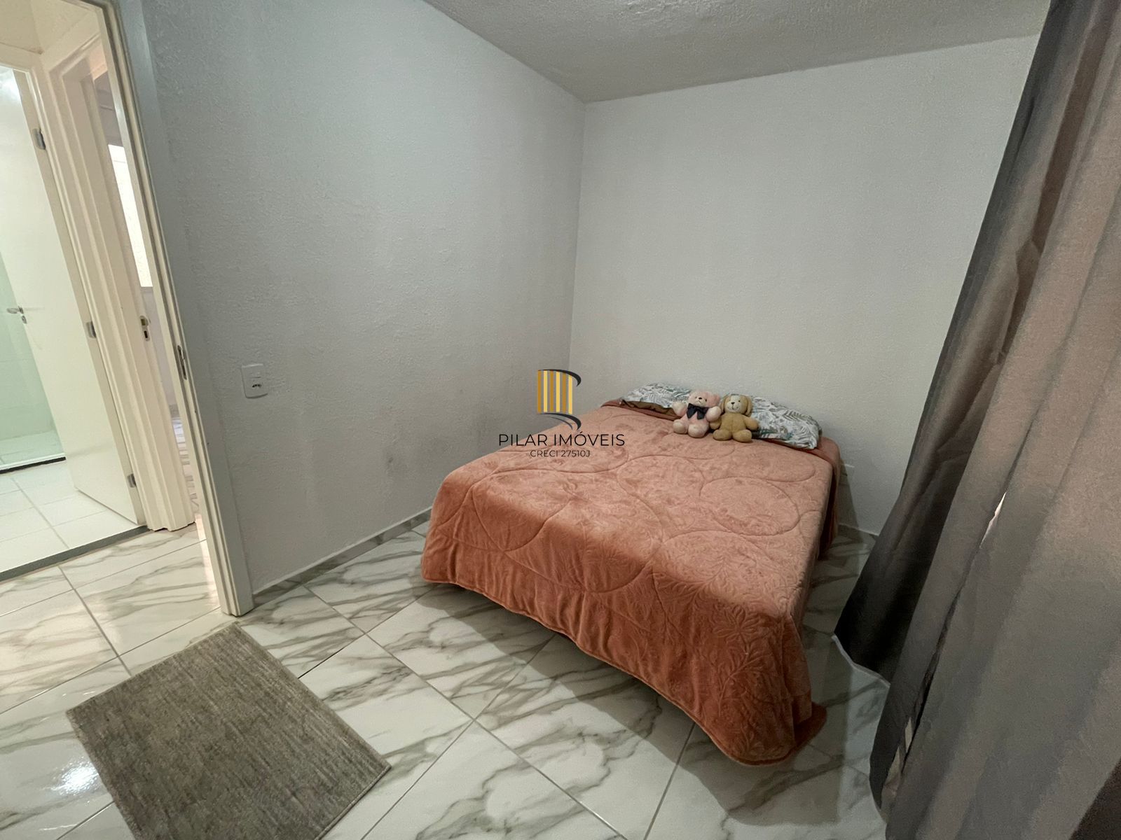 Apartamento com dois dormitórios e vaga de garagem