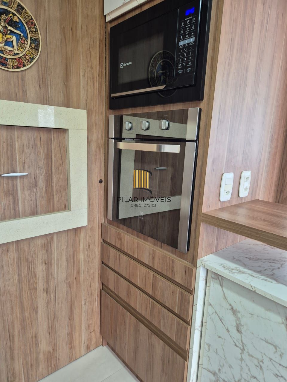 Apartamento com 02 suítes e duas vagas de garagem