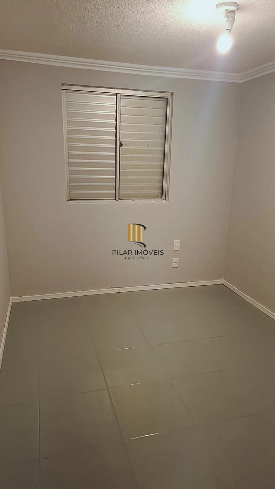 Apartamento com dois dormitórios e garagem