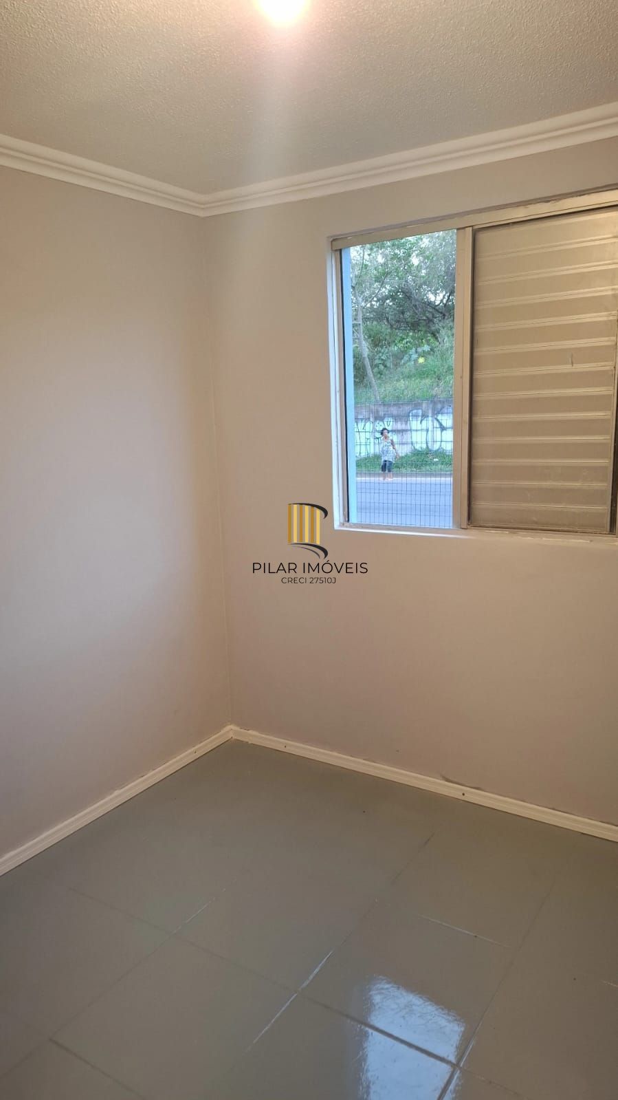 Apartamento com dois dormitórios e garagem