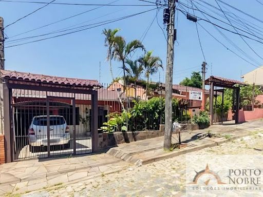 Casa com 3 dormitórios à venda, 180 m² por R$ 495.000,00 - Parque Santa Fé - Porto Alegre/RS