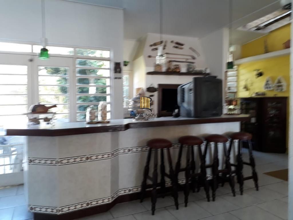 Sobrado com 4 dormitórios à venda, 498 m² por R$ 2.180.000,00 - Vila Jardim - Porto Alegre/RS