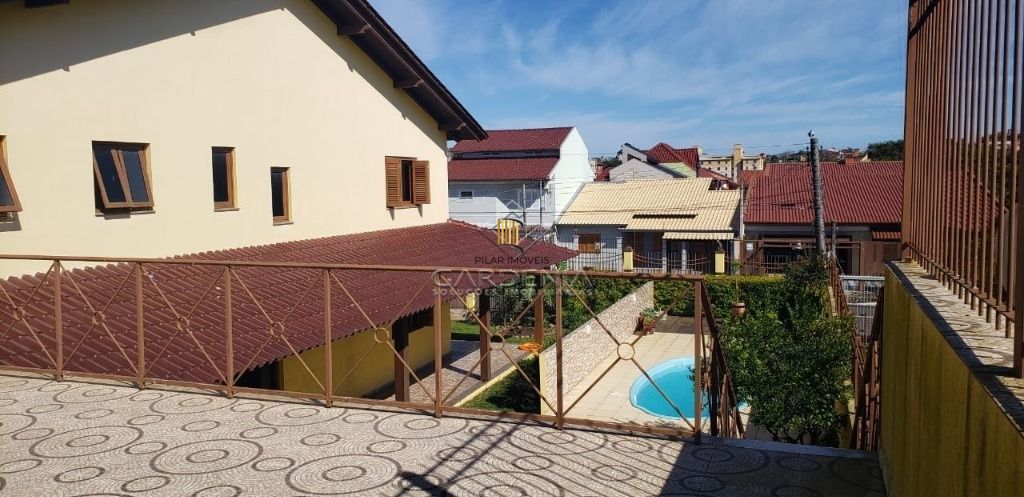 Casa com 5 dormitórios à venda, 509 m² por R$ 1.690.000,00 - Rubem Berta - Porto Alegre/RS