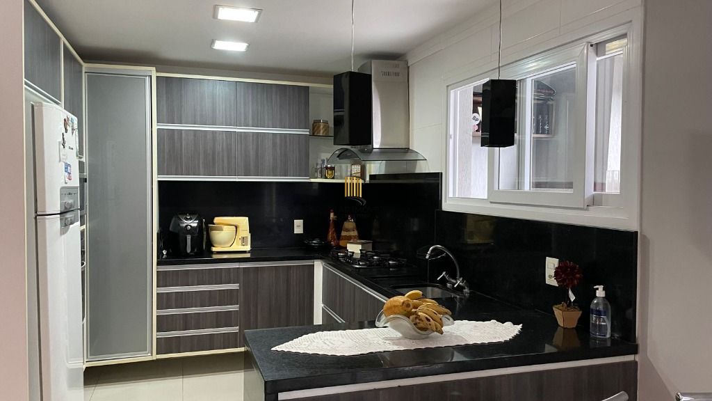 Casa com 3 dormitórios à venda, 242 m² por R$ 1.330.000,00 - Ecoville - Porto Alegre/RS