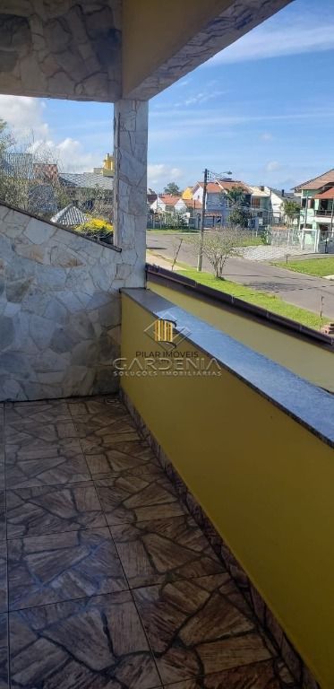 Casa com 5 dormitórios à venda, 509 m² por R$ 1.690.000,00 - Rubem Berta - Porto Alegre/RS
