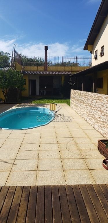 Casa com 5 dormitórios à venda, 509 m² por R$ 1.690.000,00 - Rubem Berta - Porto Alegre/RS