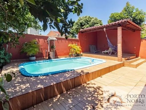 Casa com 3 dormitórios à venda, 180 m² por R$ 495.000,00 - Parque Santa Fé - Porto Alegre/RS